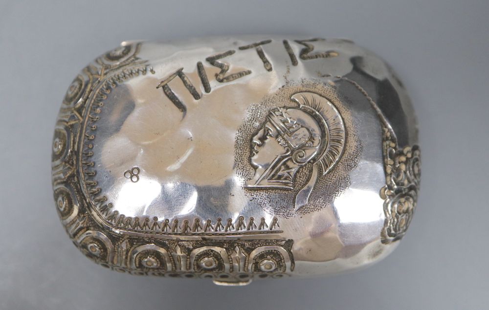 A Victorian silver mounted ovoid purse, decorated with Greek busts, Levy & Salaman, Birmingham, 1884, 72mm.